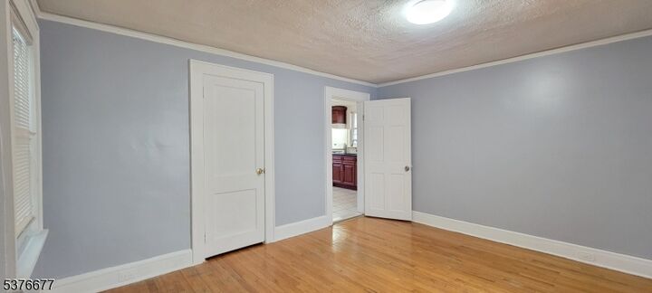 Property Photo:  122 Cross St 1  NJ 07029 