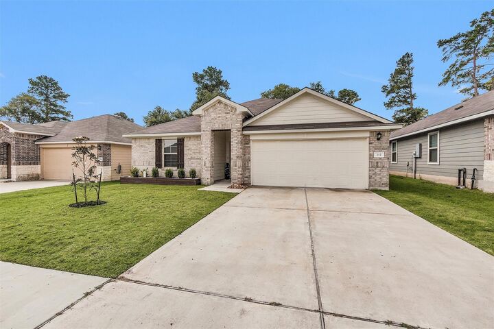 Property Photo:  312 Pecos Drive  TX 77340 