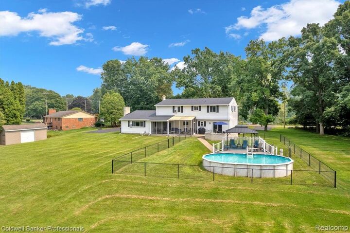 Property Photo:  1545 Rulane Drive  MI 48446 1358 