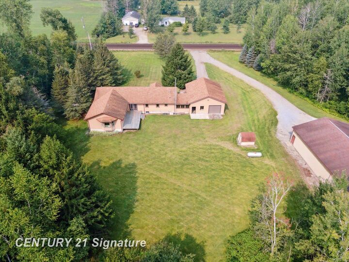 Property Photo:  132 N Nine Mile Road  MI 48640 