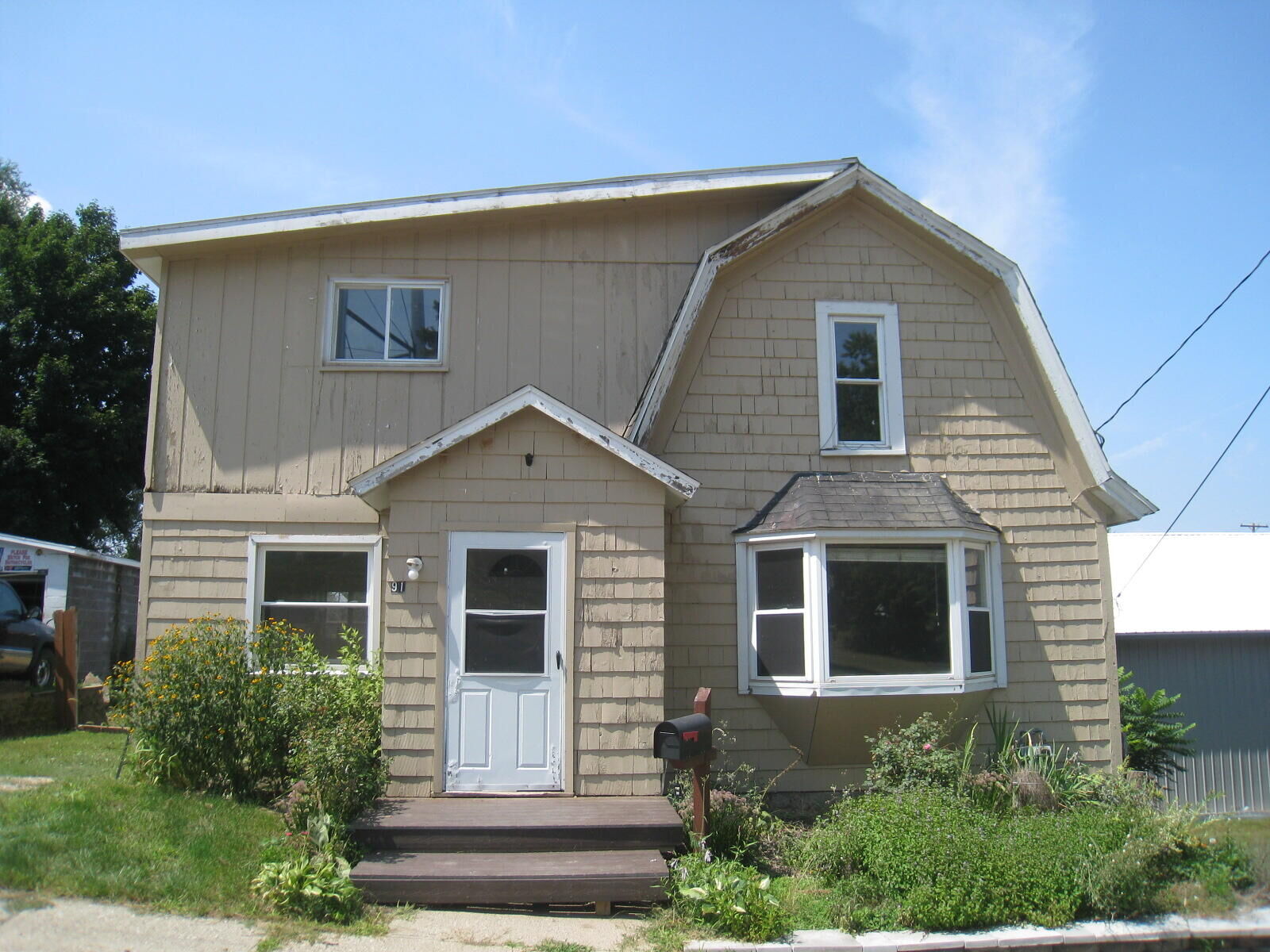 Property Photo:  91 Prospect Street NW  MI 49345 