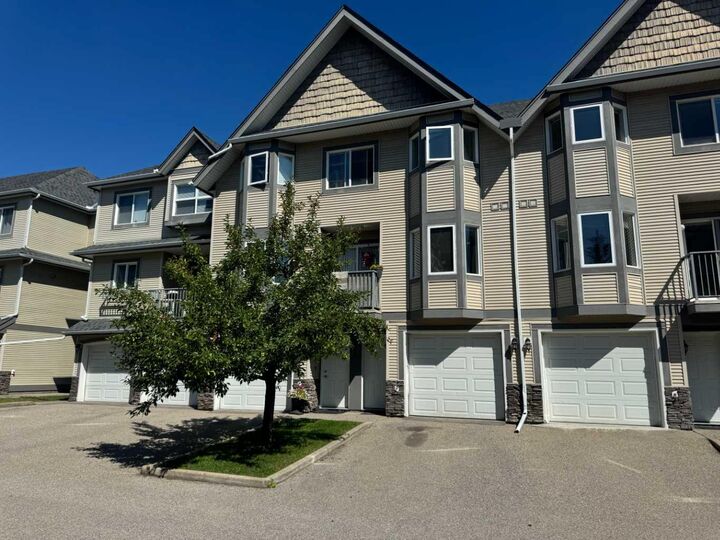 Property Photo:  143 Cedarwood Lane SW  AB T2W 6J3 