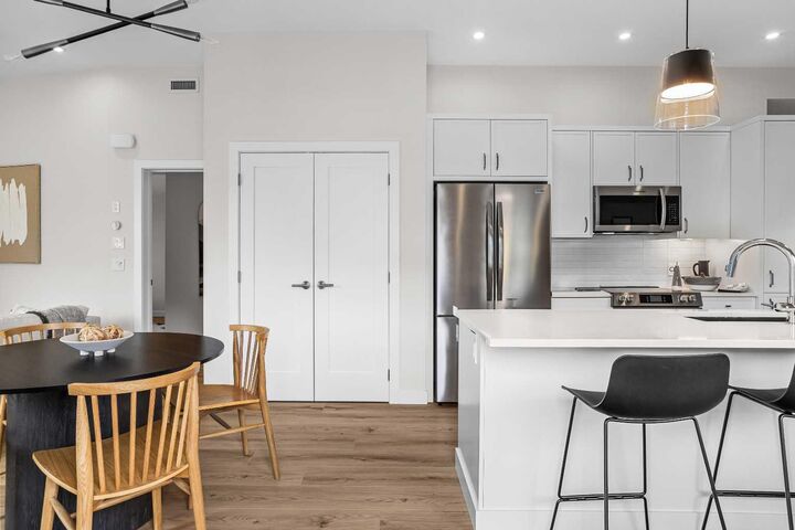 Property Photo:  209 Stewart Creek Rise 101L  AB T1W 0N9 