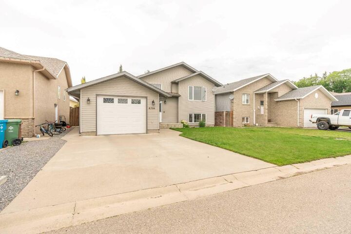 Property Photo: 4206 56 Street AB T1G 2J2