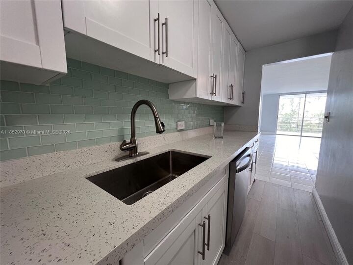 Property Photo: 3660 NE 166th St 409 FL 33160