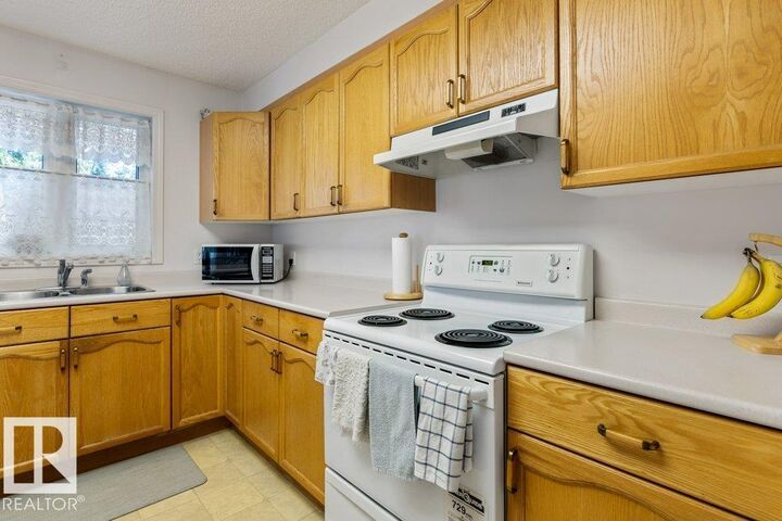 Property Photo:  160 Kingswood Boulevard 106  AB T8N 6V4 