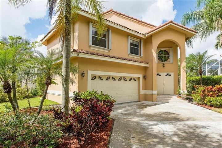Property Photo:  5911 NW 59th Ave  FL 33067 