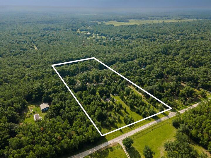 Property Photo:  3380 NE 44th Avenue  FL 32643 