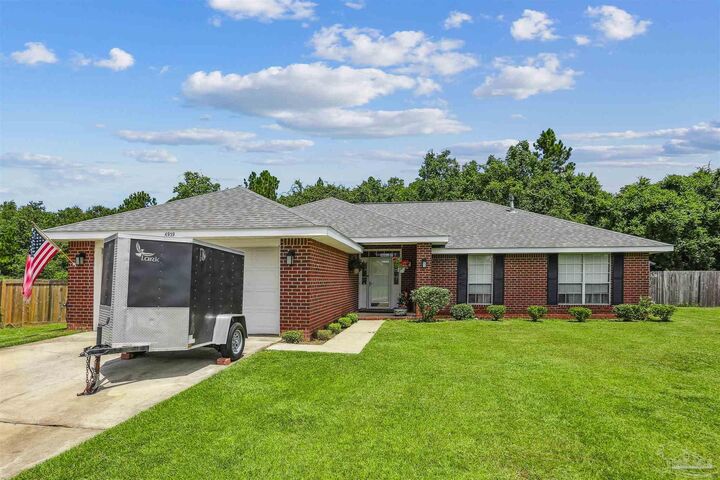 Property Photo: 6939 Fort Deposit Dr FL 32526