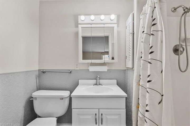 Property Photo:  204 N Holden Road  NC 27410 