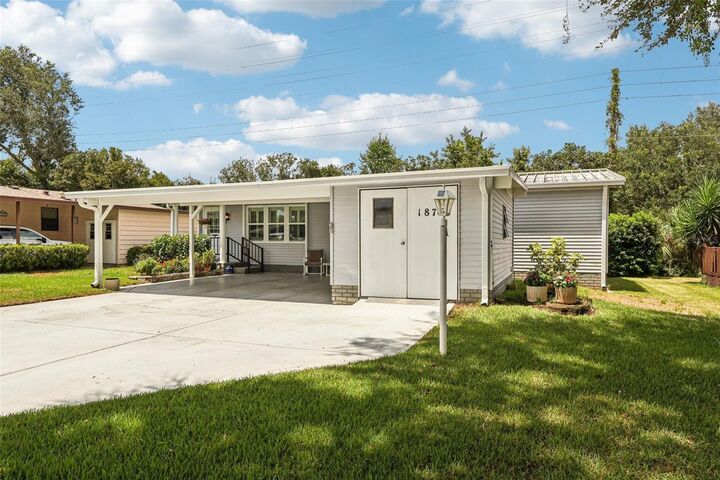 Property Photo:  1877 W Schwartz Boulevard  FL 32159 