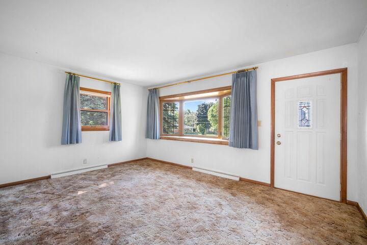 Property Photo:  11708 W Bobolink Ave  WI 53225 