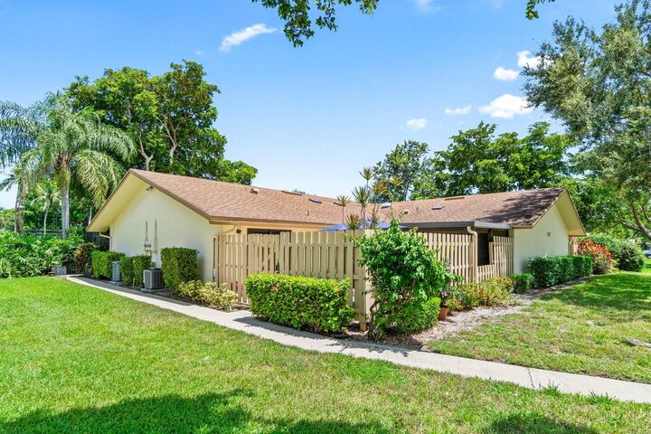 Property Photo:  825 NW 29th Avenue B  FL 33445 