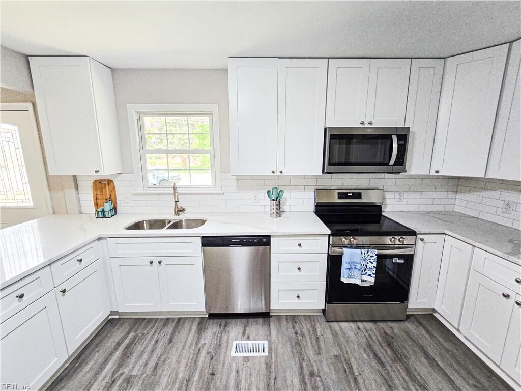 Property Photo: 7936 Azalea Garden Rd VA 23518