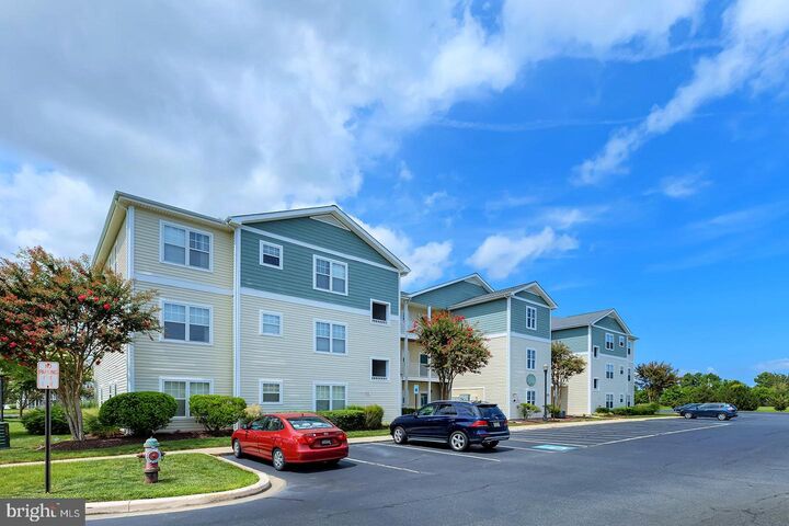 Property Photo:  33192 N Village Loop 5202  DE 19958 