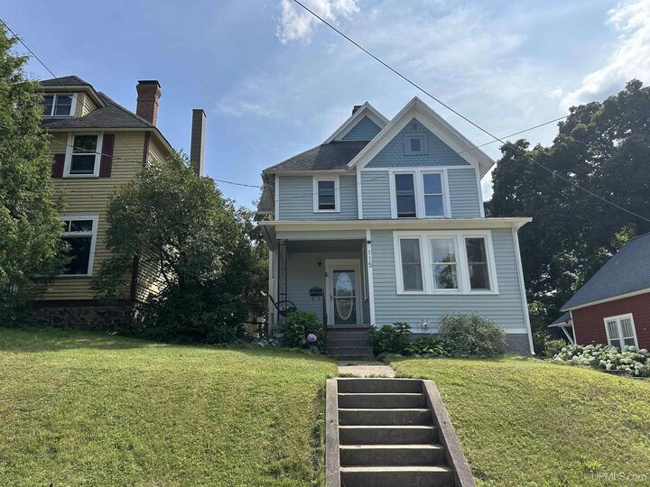 Property Photo:  115 W Crescent Street  MI 49855 