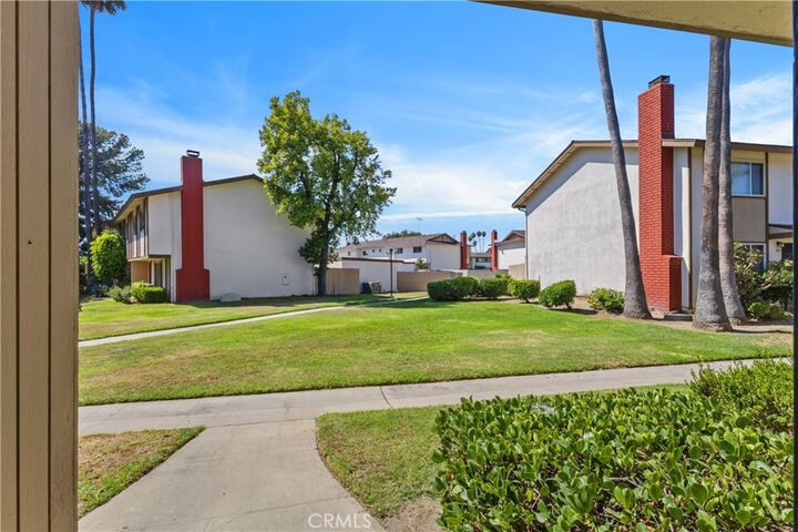 Property Photo: 1722 Mitchell Avenue 123 CA 92780
