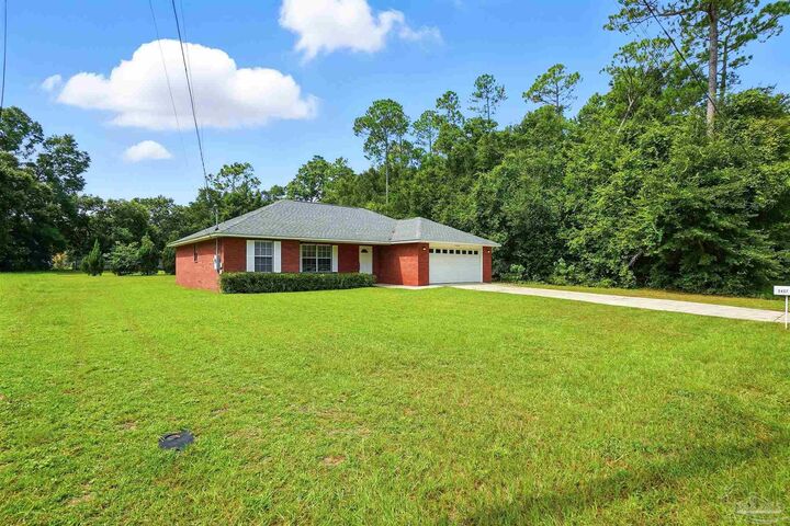 Property Photo:  5457 Windham Rd  FL 32570 