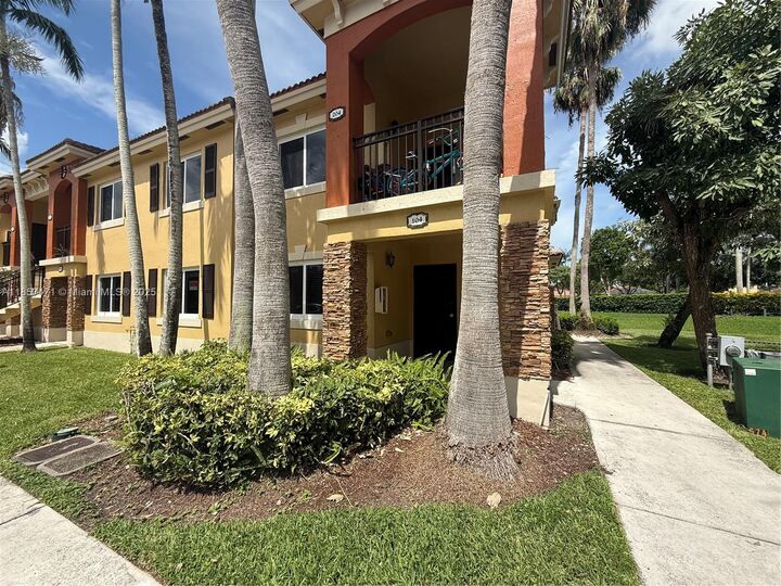 Property Photo:  945 NE 34th Ave 104  FL 33033 