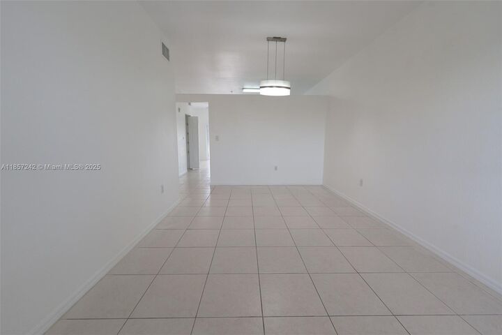 Property Photo:  6930 NW 179th St 407-8  FL 33015 