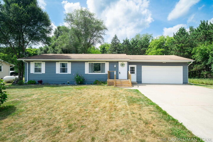 Property Photo: 745 Flat River Drive SE MI 49331