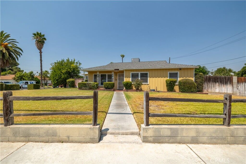 Property Photo:  8817 Wells Avenue  CA 92503 