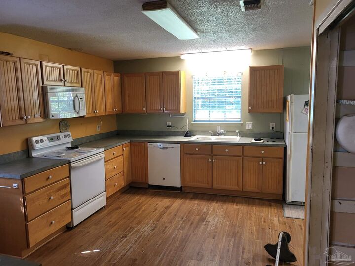 Property Photo:  5329 E Avenida De Golf  FL 32571 