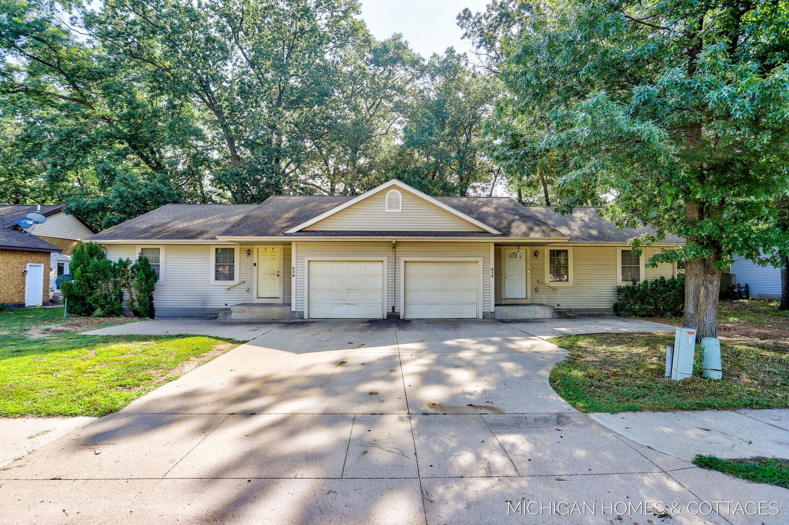 Property Photo:  508 512 Quarterline Road  MI 49442 