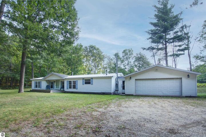 Property Photo:  8303 E Sparling Road  MI 49633 