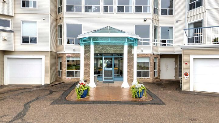 Property Photo:  6118 53 Avenue 408  AB T4N 6P7 