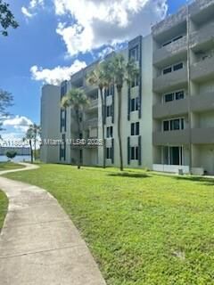 Property Photo:  10000 NW 80th Ct 2126  FL 33016 