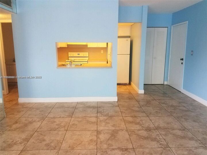 Property Photo: 561 NW 107th Ave 205 FL 33172
