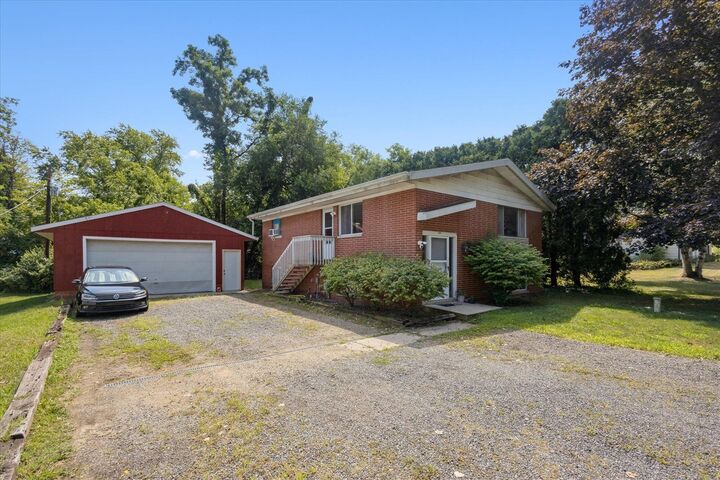 Property Photo: 7039 Curtis Drive MI 49038-9521