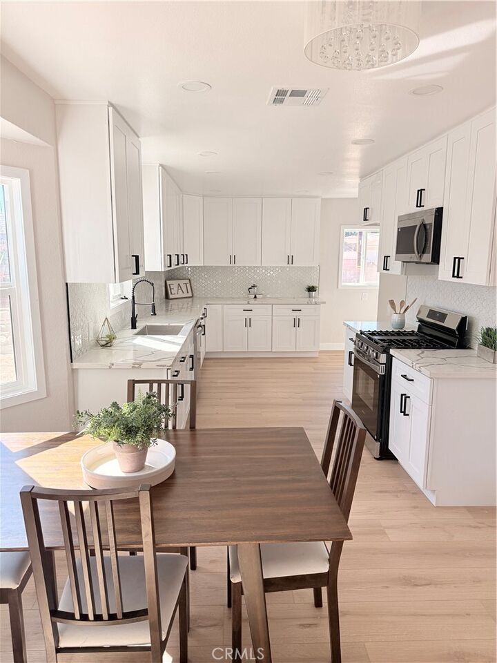 Property Photo:  9533 Paramount Boulevard  CA 90240 