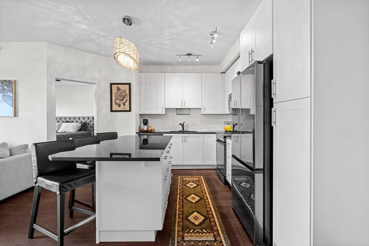 Property Photo: 755 Copperpond Boulevard SE 4406 AB T2Z 4R2