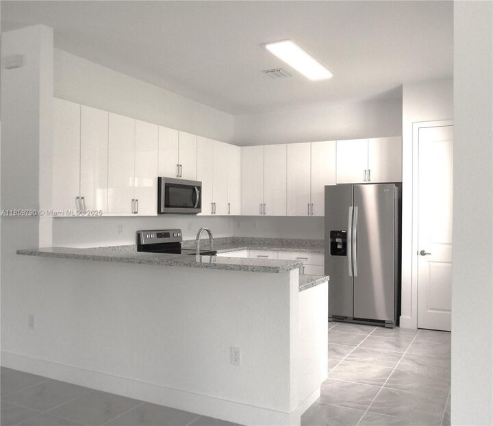 Property Photo:  11998 SW 232nd St -  FL 33170 