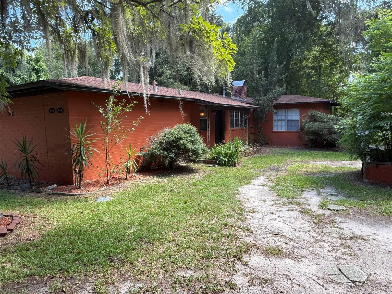 Property Photo:  1830 SW Williston Road  FL 32608 