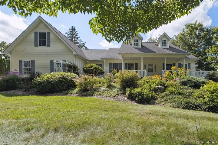 Property Photo:  7127 Perry Lake Road  MI 48346 1655 