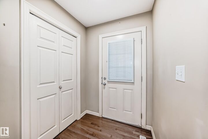 Property Photo: 655 Tamarack Road NW 7 AB T6T 0N4