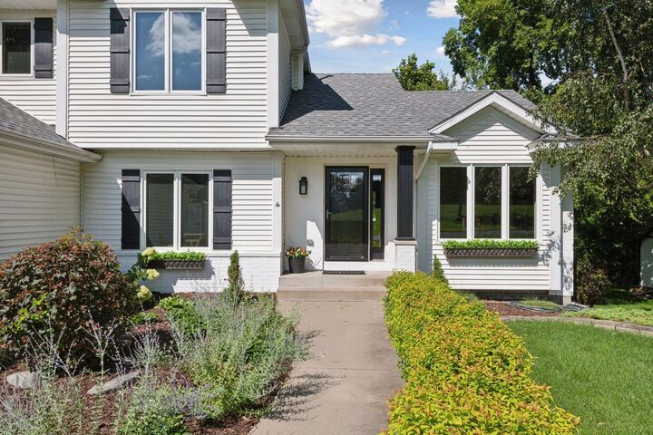 Property Photo:  1590 Woodstone Drive  MN 55386 