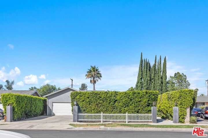 Property Photo: 7007 Cozycroft Ave CA 91306