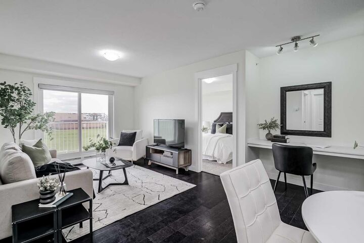 Property Photo:  302 Skyview Ranch Drive NE 7404  AB T3N 0P5 