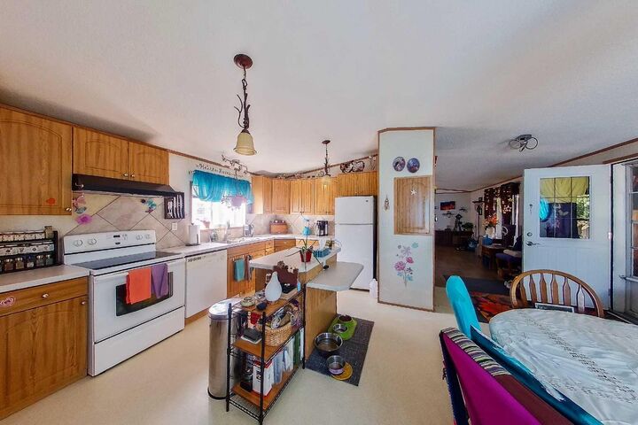 Property Photo: Range Road 283 #30 38138 AB T4S 2B4