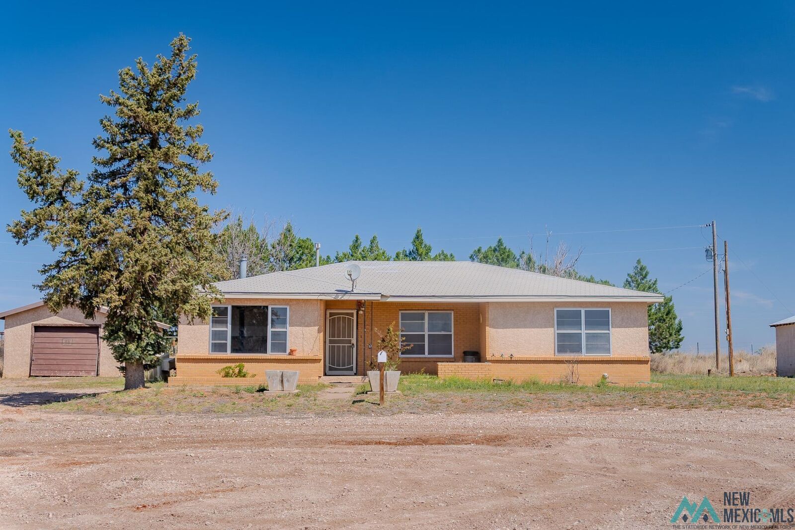 Property Photo:  305 S Roosevelt Road O Road  NM 88130 
