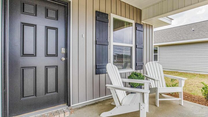 Property Photo: 6379 June Bug Dr FL 32583