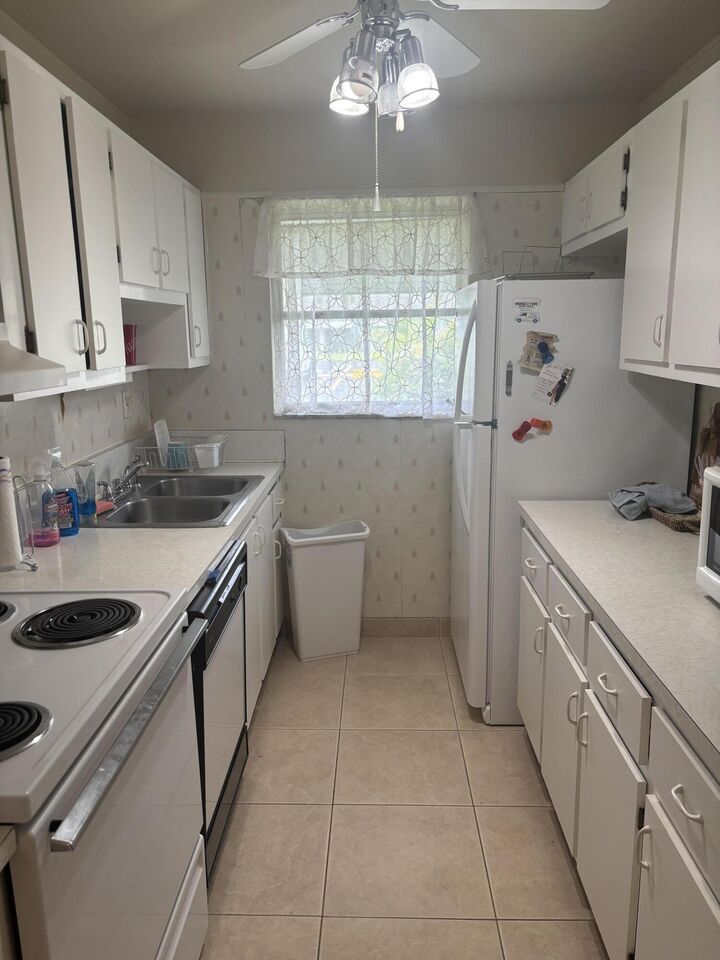 Property Photo:  445 High Point Boulevard C  FL 33445 