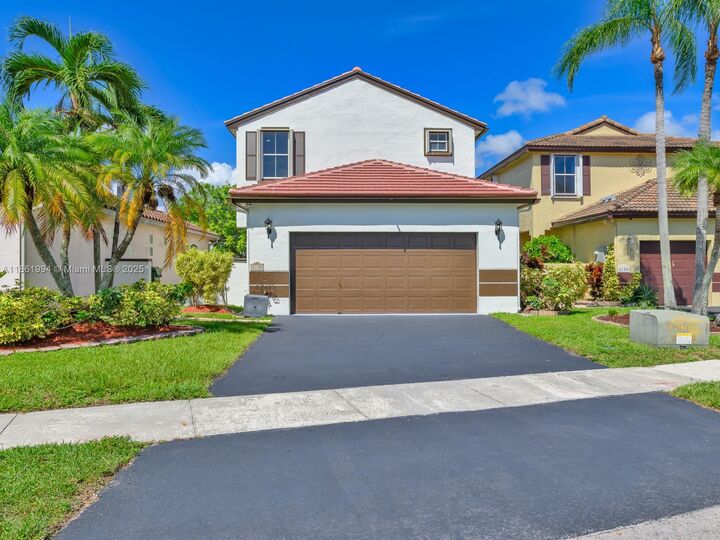 Property Photo: 2130 NW 184th Way FL 33029