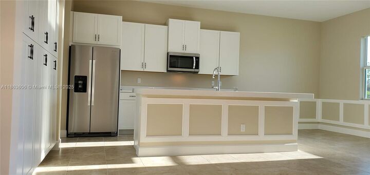 Property Photo:  14982 Wildwood Cir  FL 33470 