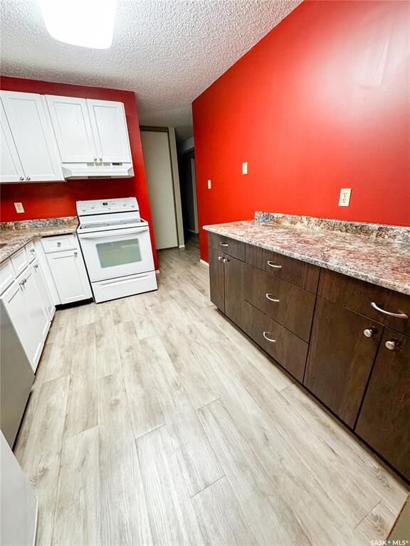 Property Photo:  1130 9th Avenue NE 207  SK S9H 2S9 