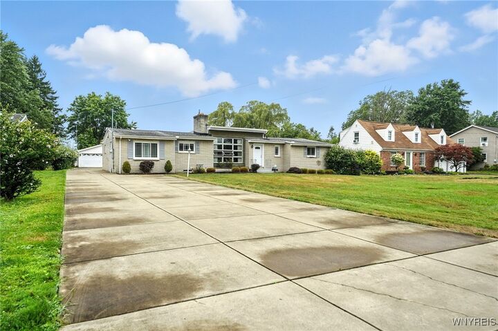 Property Photo: 4990 Meadowbrook Road NY 14221